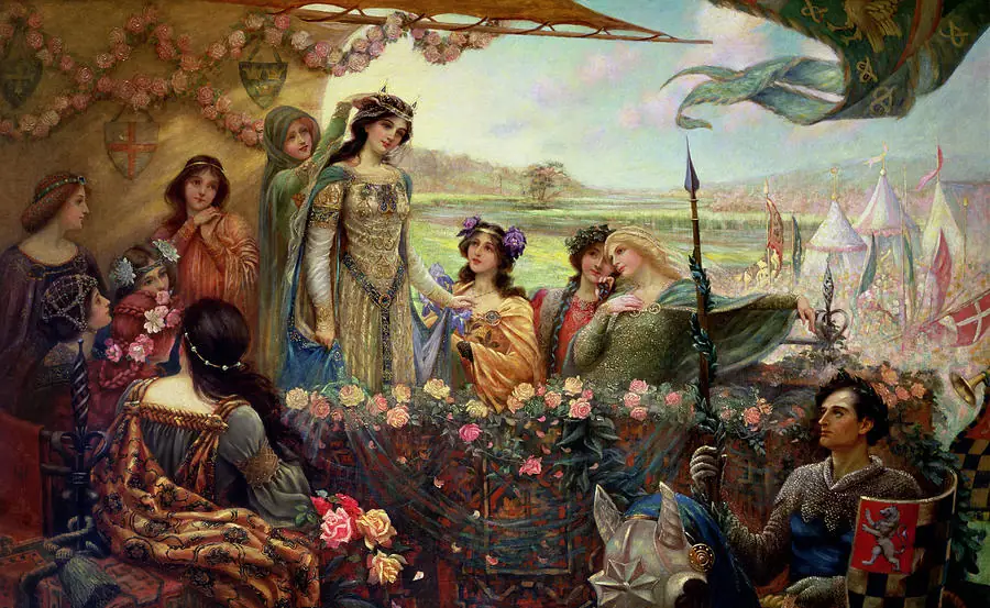 A group of beautifully dressed medieval ladies sit around Queen Guinevere, who stands in the middle. While one lady adjusts the tiara on Guinevere's head, all the ladies look at her adoringly, and so does armored Lancelot, passing before their box on his horse.